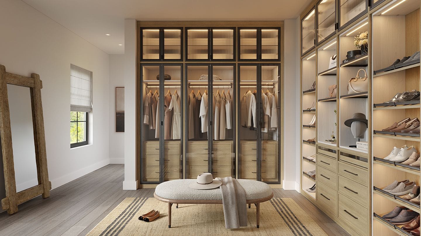 Walk-in closet for wardrobe, shoes, jewelry, bags and more created with LED lighting by California Closets